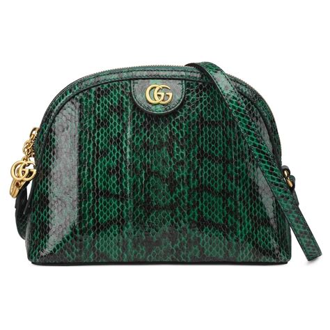 green Gucci bag with snake